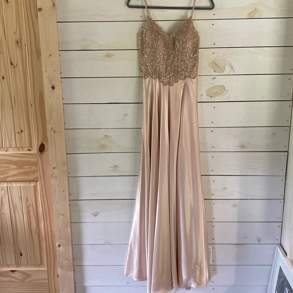 Prom gown. Size 6 very long. Minor water spot that could be spot cleaned.